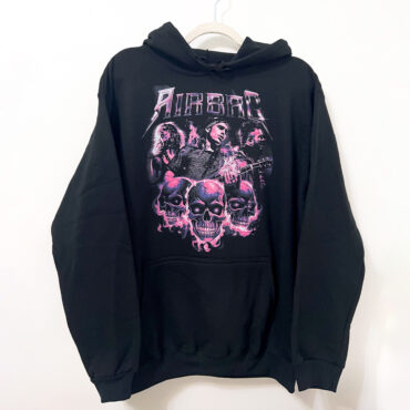 a black sweatshirt with pink skulls on it - AIRBAG-CANGURO